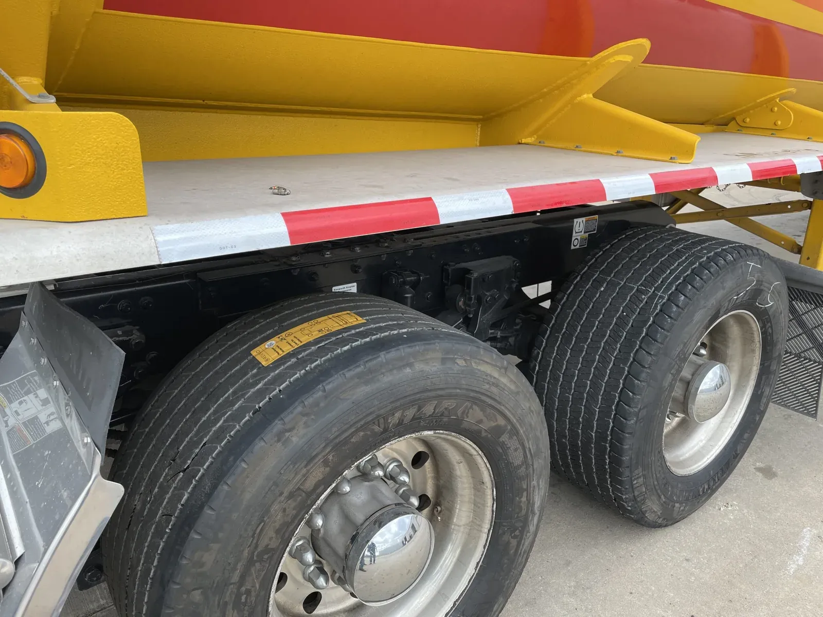 Commercial truck tires being reviewed during fleet maintenance